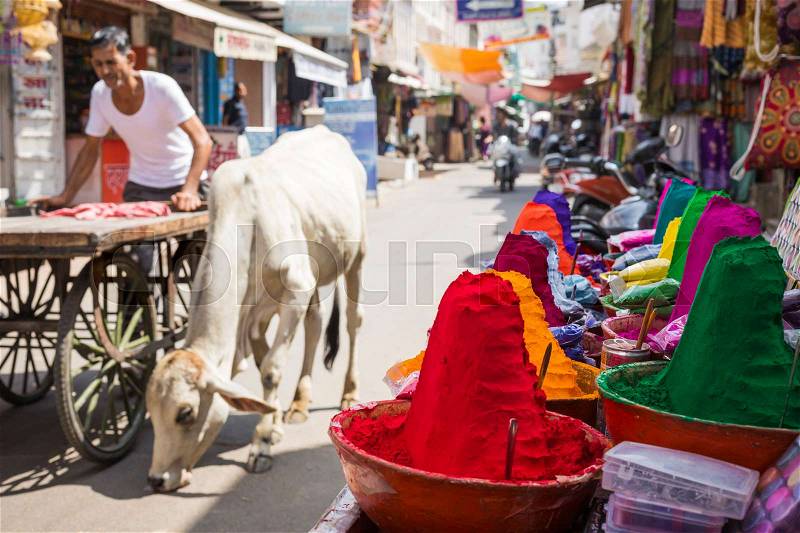 Colorful tika powders on indian market, India , Asia, stock photo