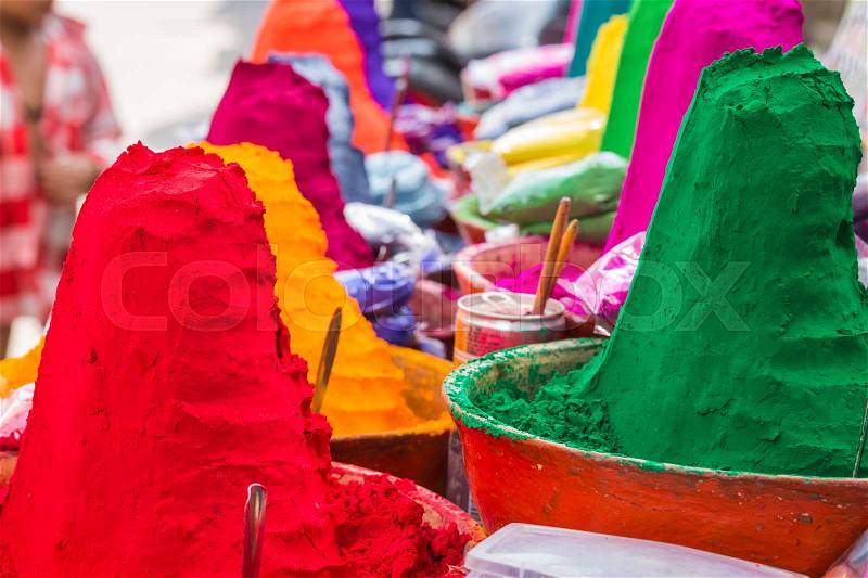 Colorful tika powders on indian market, India , Asia, stock photo