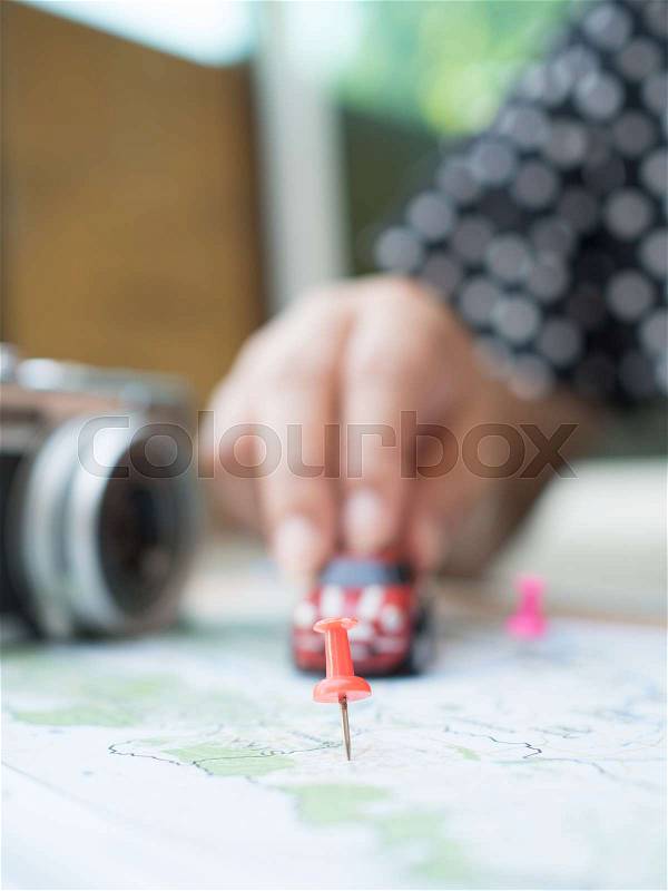 Woman hand and symbol of travel with map and modern transportation, destination and goal of human dream, stock photo