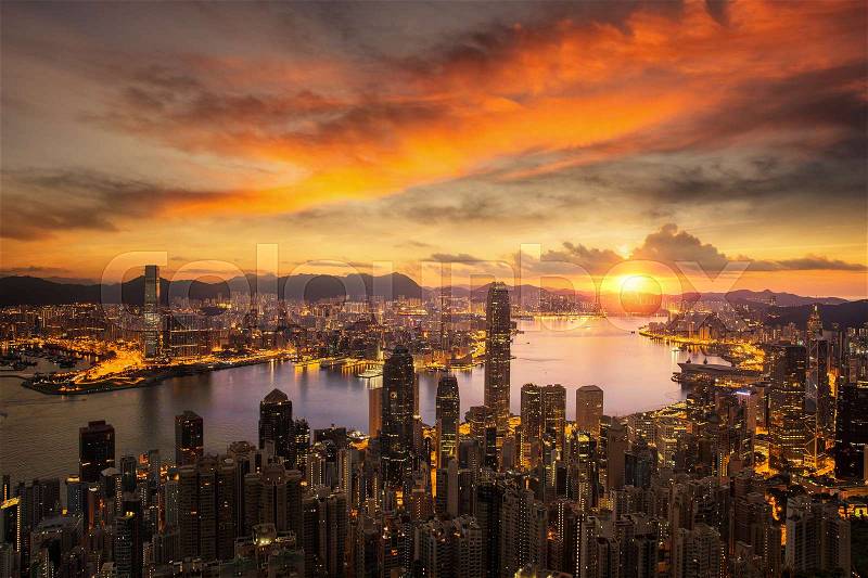 Day to night for Hong kong city sunrise and Hongkong harbor from victoria peak, Hongkong city, China, stock photo