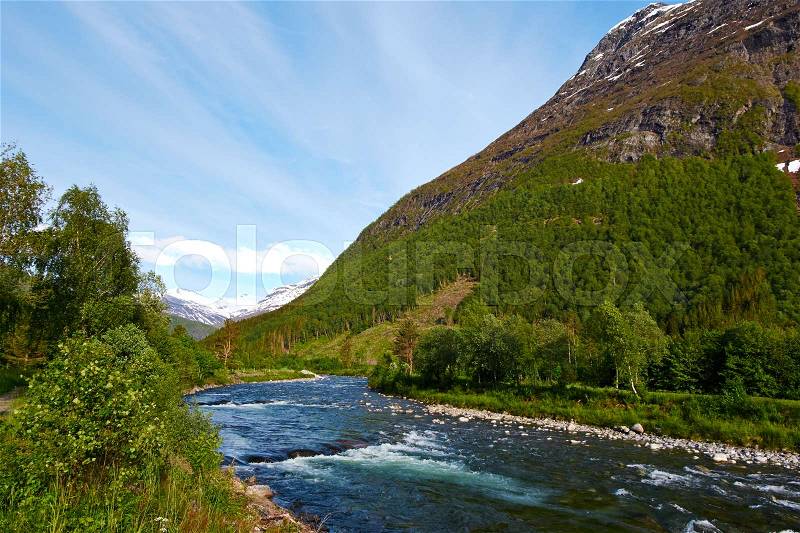 Mountain and river in norway, stock photo