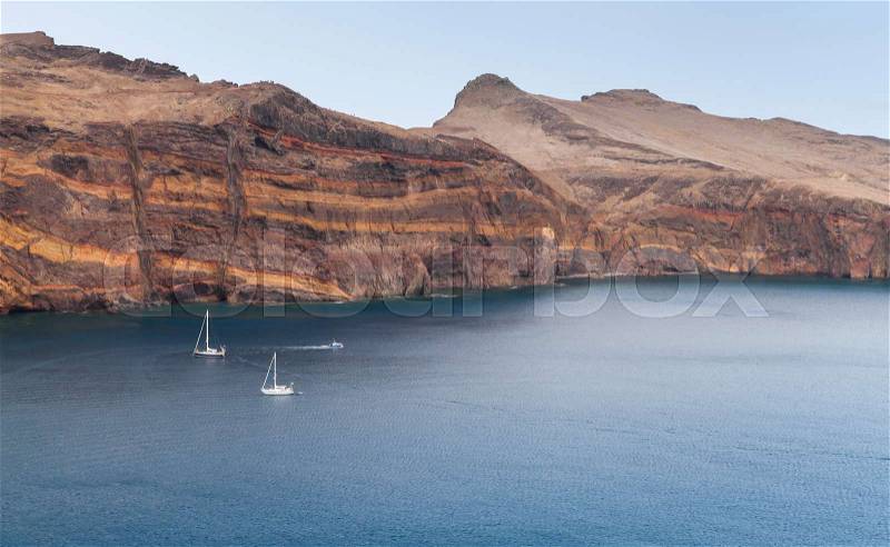Sailing yachts in bay of Ponta de Sao Laurenco. Coastal landscape of Madeira, Portugal, stock photo