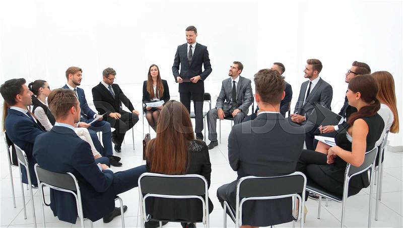 Coach leads the session with the business team. business and education, stock photo