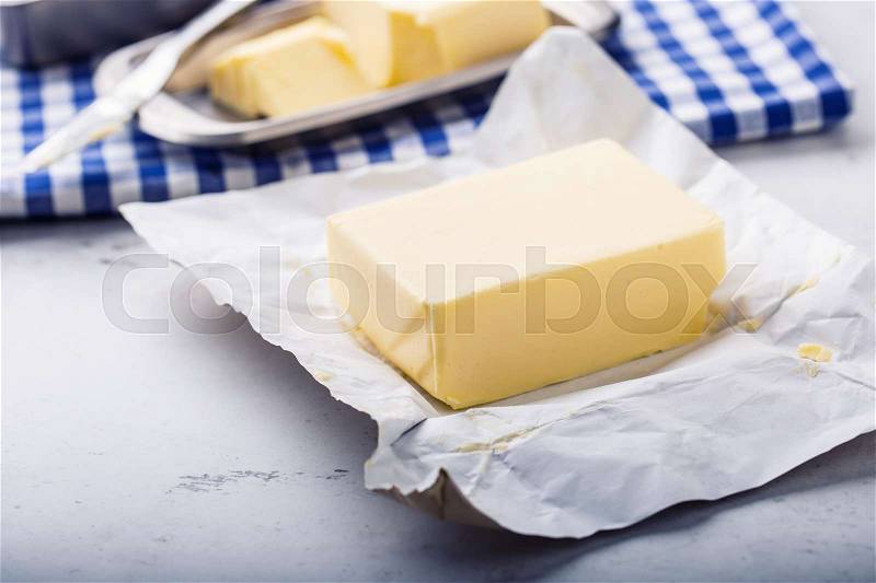 Butter. fresh butter on the kitchen table, stock photo