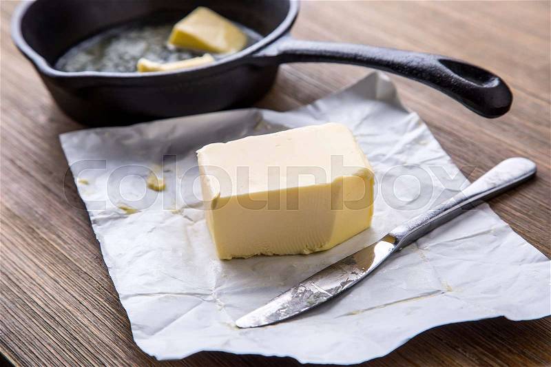 Butter. fresh butter on the kitchen table, stock photo