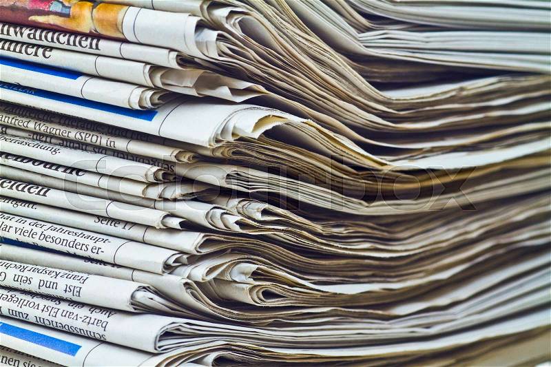 Image of a stack of newspaper , stock photo