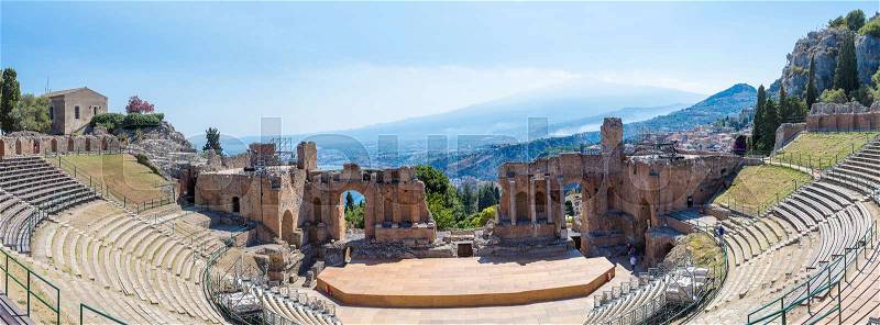 Ruins of the ancient Greek theater in Taormina, Sicily, Italy in a beautiful summer day, stock photo