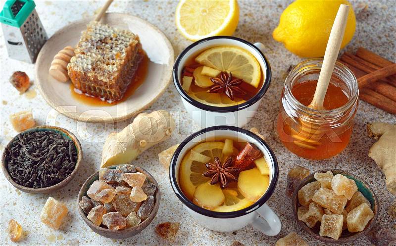 Firming tea with spices, lemon and ginger, flu and cold prevention, stock photo