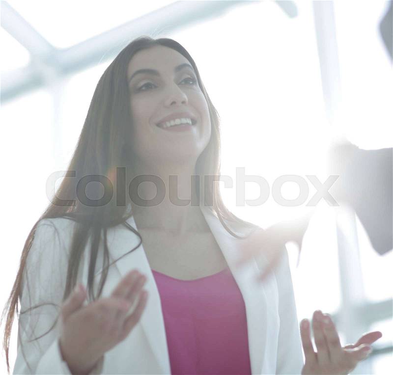 Successful business woman talking with a client, stock photo