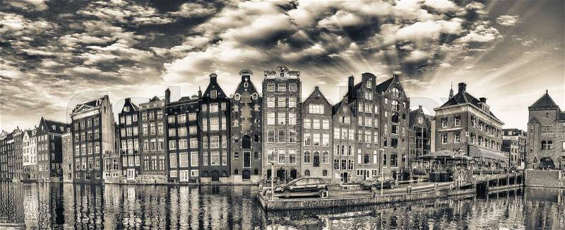 Dutch scenery with its canal side houses. Amsterdam panoramic skyline, stock photo