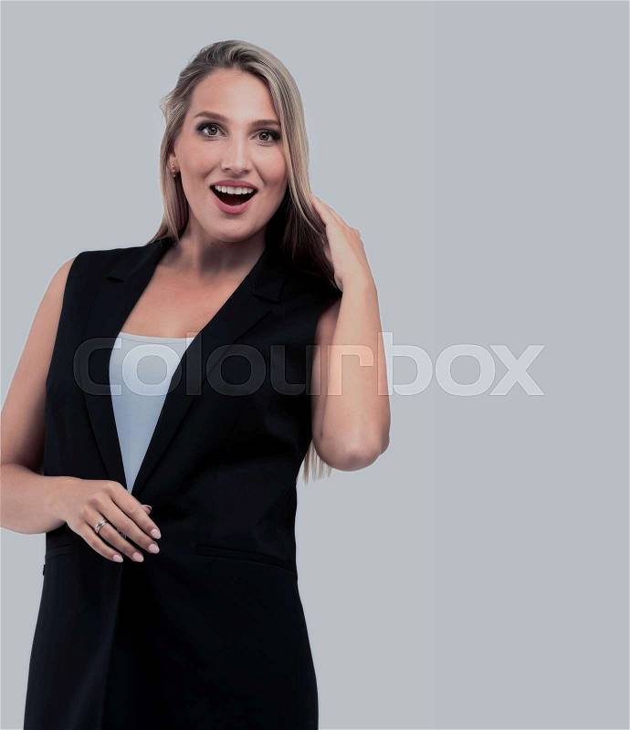 Portrait of young happy smiling businesswoman isolated against white background, stock photo
