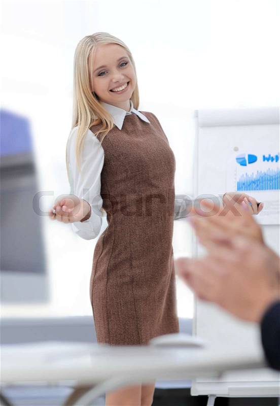 Young professional speaking makes a report on the business presentation. women and career, stock photo