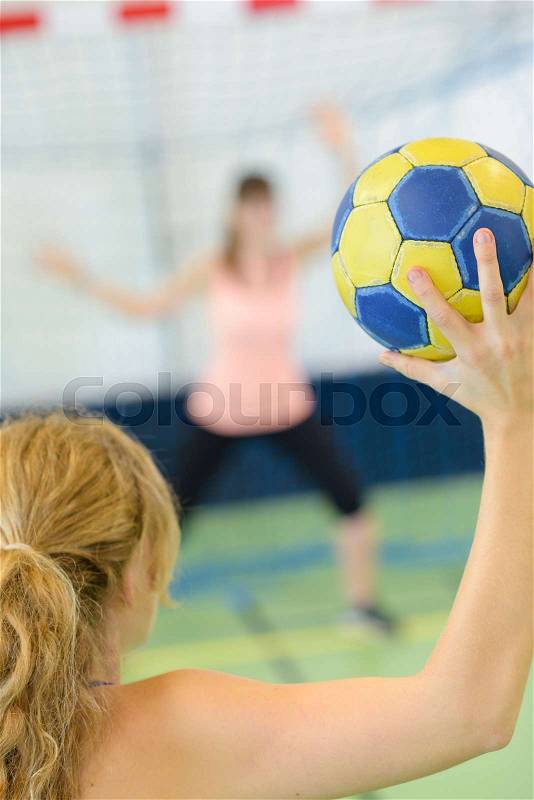 Women playing handball, stock photo
