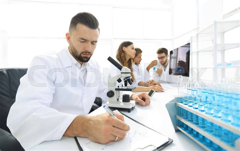 Young scientist works in the lab.concept of teamwork, stock photo
