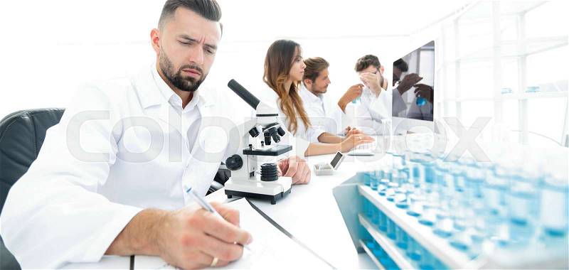 Young scientist works in the lab.concept of teamwork, stock photo