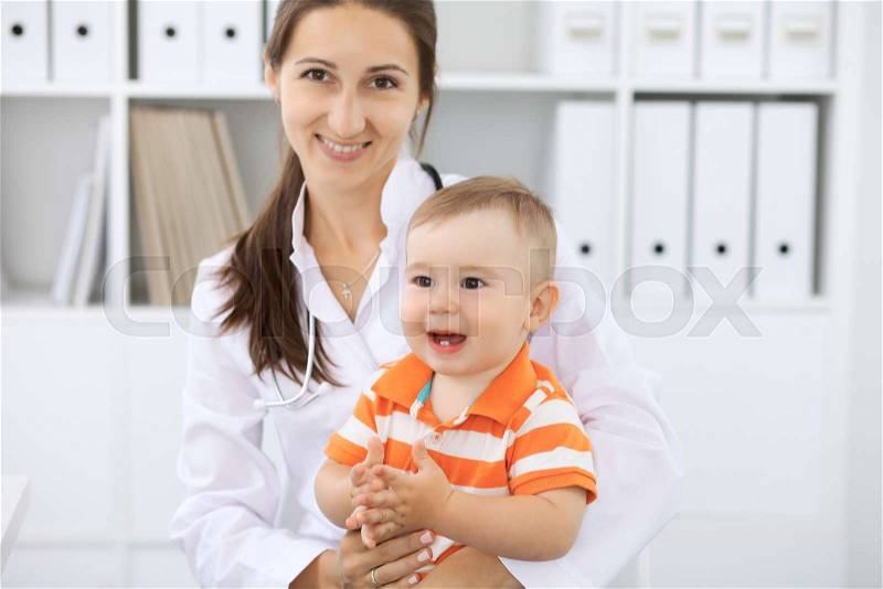 Little boy child at health exam at doctor\'s office, stock photo