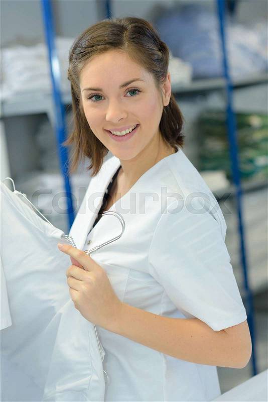 Portrait of woman in hospital laundry, stock photo