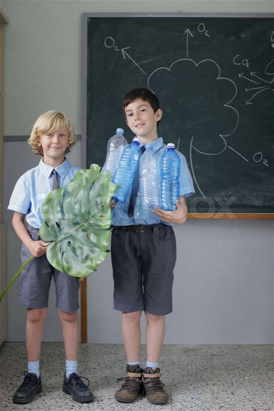 School boys giving science presentation, stock photo