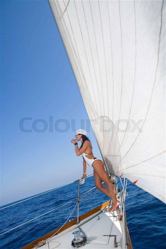Sexy captain woman sailboat, stock photo