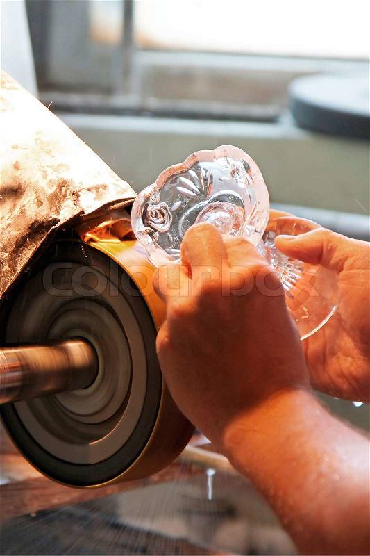 Hand work - glass-cutting in factory, stock photo