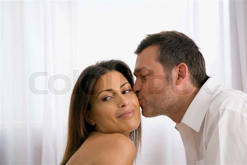 Natural image of young couple at home, stock photo