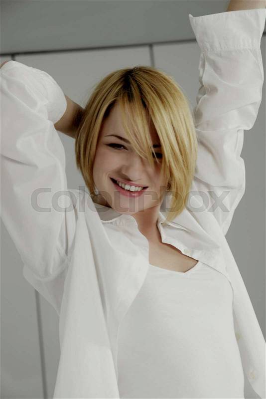 Portrait of woman, hand in the air, stock photo
