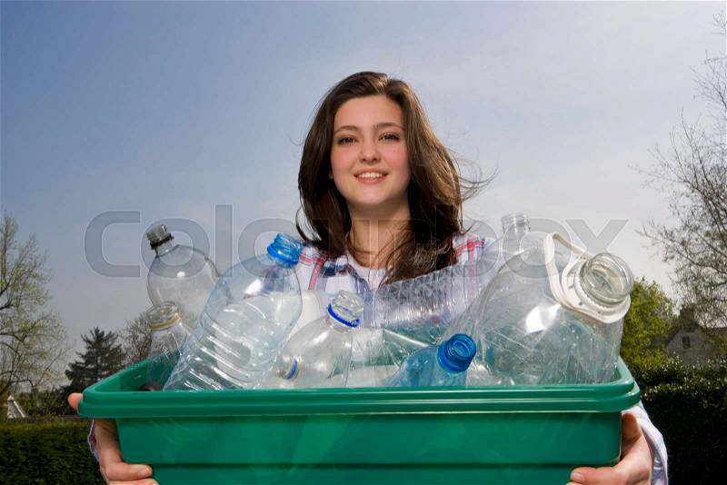 Child Recycling at home, stock photo