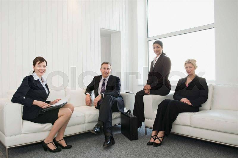 A portrait of four business people, stock photo