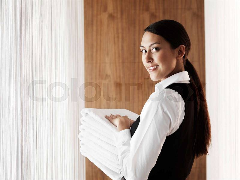 Female hotel worker, stock photo