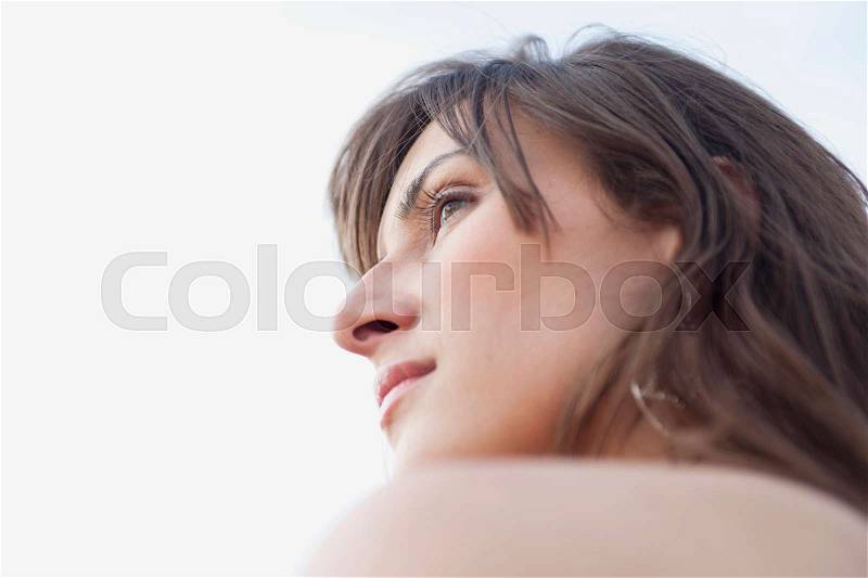 Woman looking into distance, stock photo