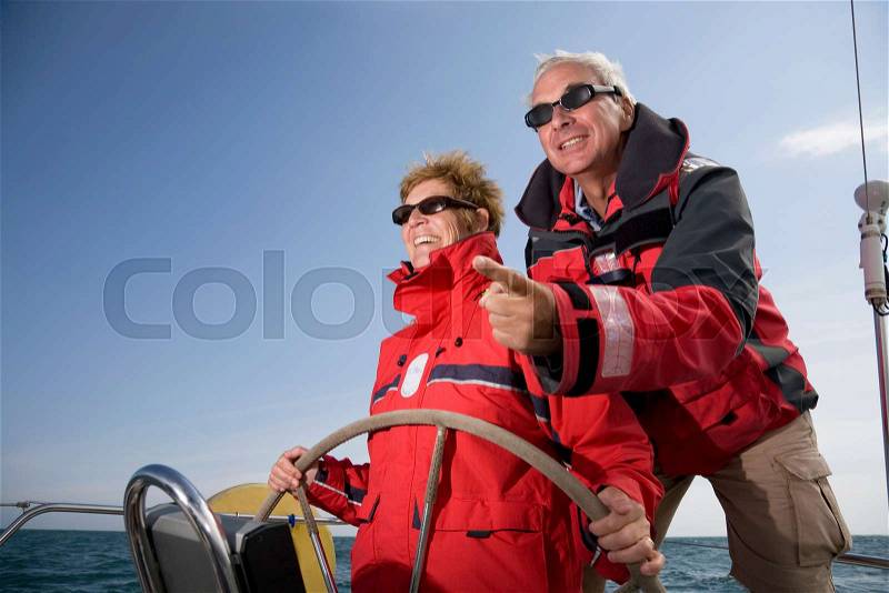 Couple sailing yacht, stock photo