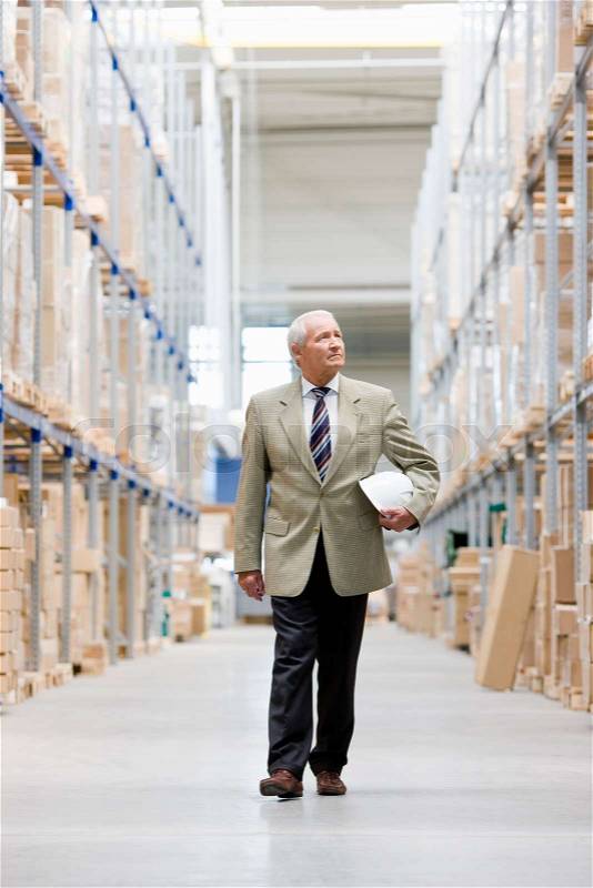Man in charge in storage, stock photo
