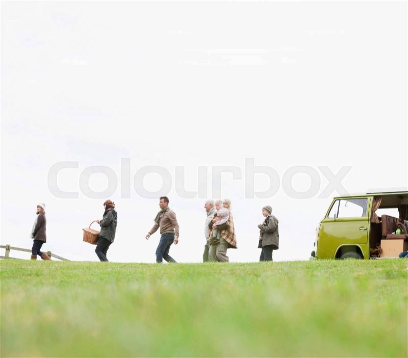 Family heading out for picnic, stock photo