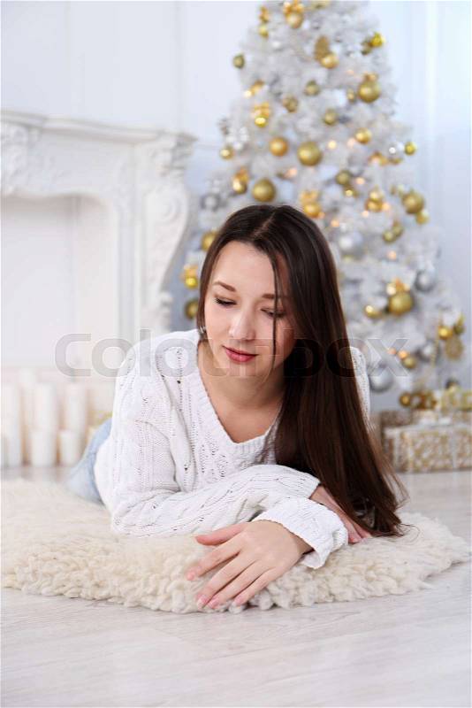 Beautiful young asian woman in the New Year\'s interior, stock photo