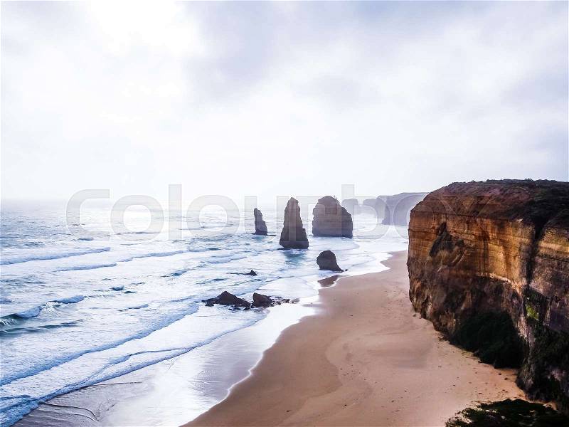 Twelve Apostles, famous landmark along the Great Ocean Road. Tourist attraction and travel destination along Australian coastline, Victoria, Australia, stock photo