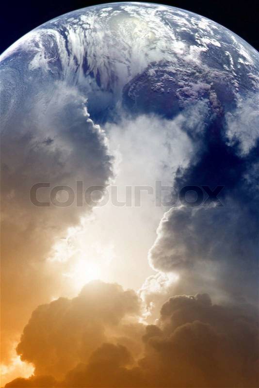 Planet Earth in space, sky with clouds and bright sun, stock photo