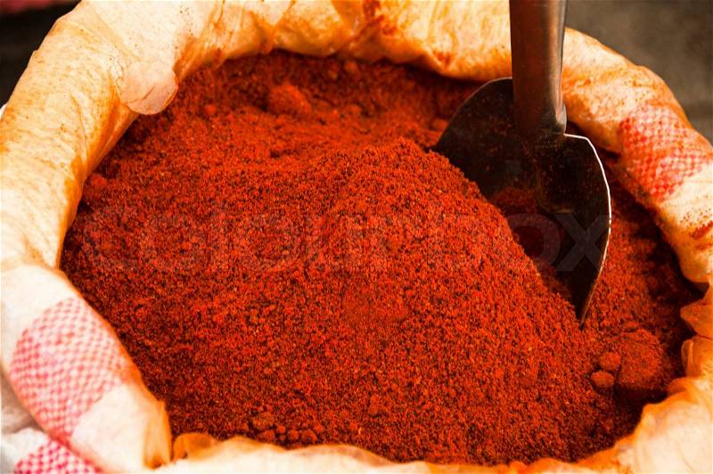 Heap of red ground paprika sold at Egypt Bazaar MisirCarsisi in Istanbul, Turkey, stock photo