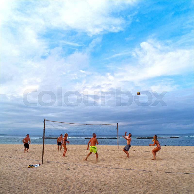 BALI, INDONESIA - AUGUST 16: Beach Volleyball challenge between young people in Nusa Dua August 16, 2017 on the Bali, Indonesia, stock photo