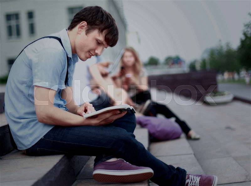 Young man read book , stock photo