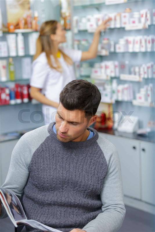 Carefree guy waiting for cosmetic treatment, stock photo