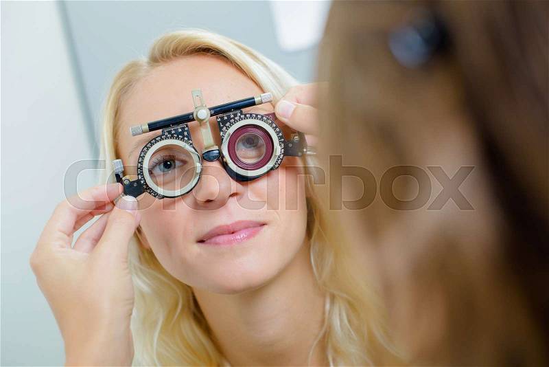 Lady having eye examination, stock photo