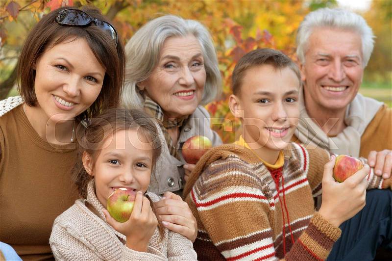 Big happy family on picnic in autumn, stock photo