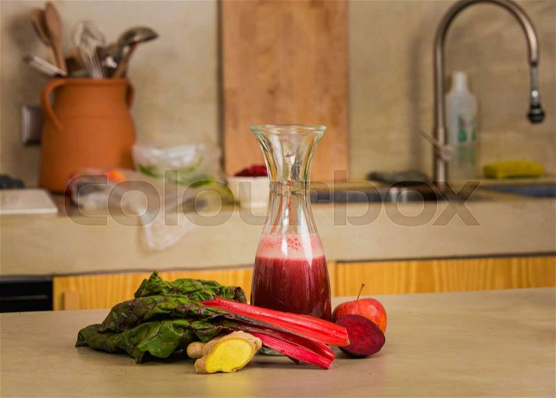 Glass jar of red juice, a detox beverage. , stock photo