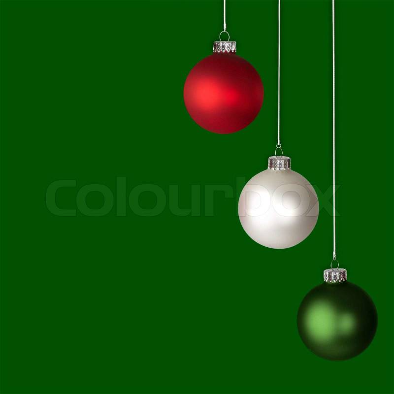 White, Red and Green Christmas Ornaments On Silver Bokeh Background, stock photo