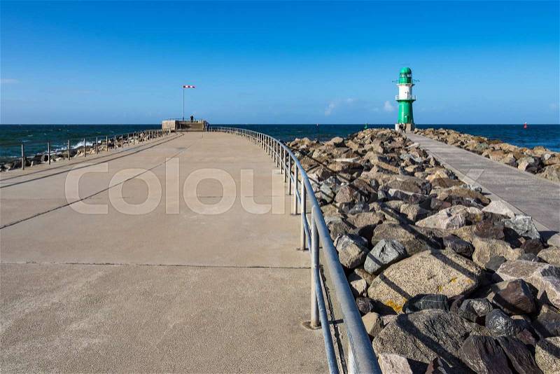 The mole on the Baltic Sea coast in Warnemuende, Germany, stock photo