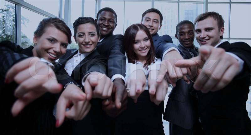 Large group of multiethnic business people pointing their finger, stock photo