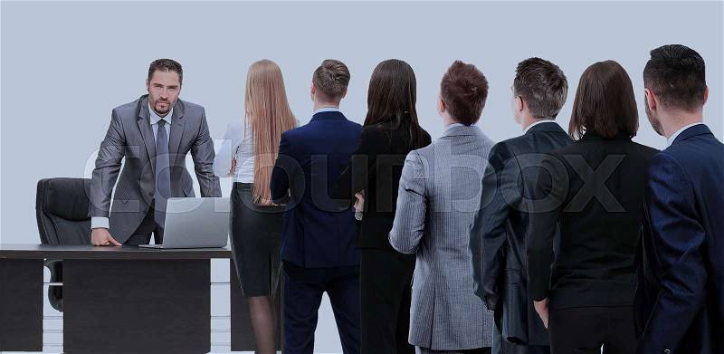 Business people looking at boss standing back side, stock photo
