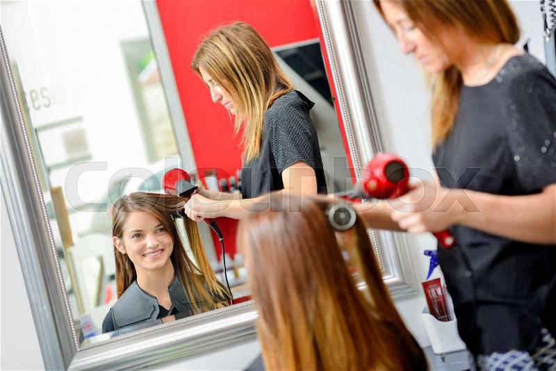 Happy to get her hair done, stock photo