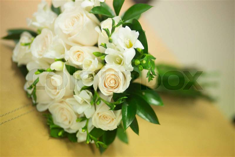 Civil non religious wedding ceremony registry office bridal bouquet of roses flowers of the bride, stock photo