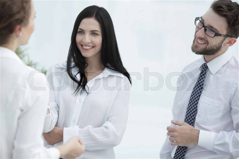 Close-up of company employees in the office. business background, stock photo